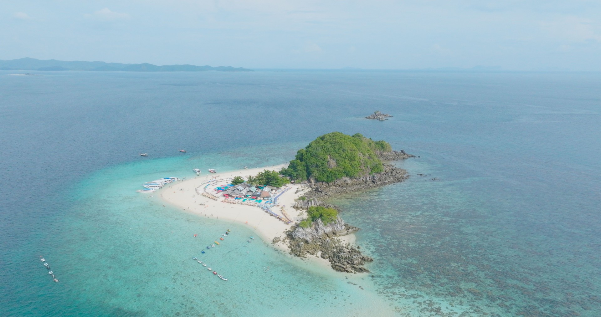 Aerial View of Koh Khai Islands' Vibrant Shores: A Tropical Gem in the Andaman Sea near Phuket, Thailand.